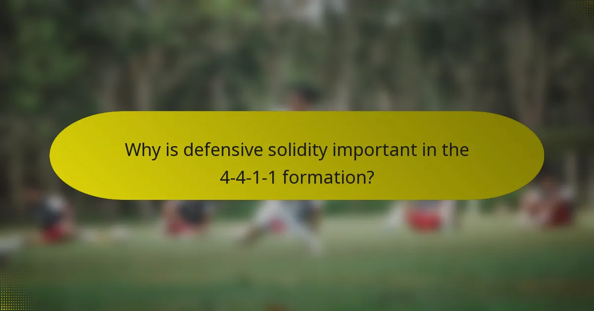 Why is defensive solidity important in the 4-4-1-1 formation?